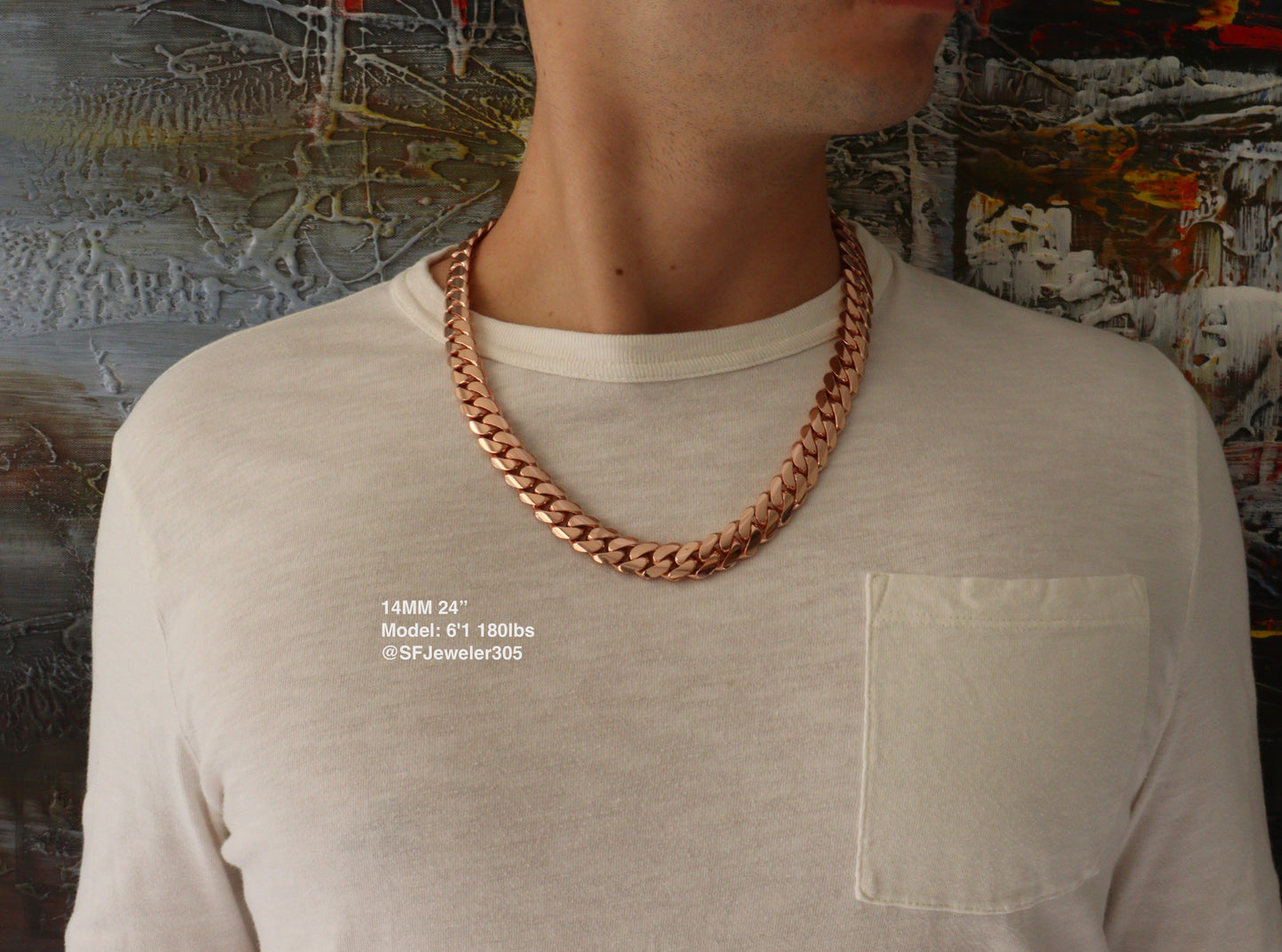 Man wearing a 14MM 24 inch rose gold over silver Cuban link chain, modeled by SF Jeweler 305. The bold Miami Cuban chain has a heavy, polished finish and is styled with a casual t-shirt.