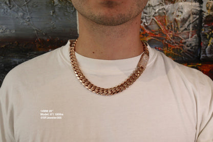 14MM Cuban Link Chain in rose gold over silver with fully iced-out VVS1 Moissanite Stones Lock, 20-inch length, modeled on a 6’1” 180 lbs male wearing a white shirt. Jewelry by SF Jeweler 305.